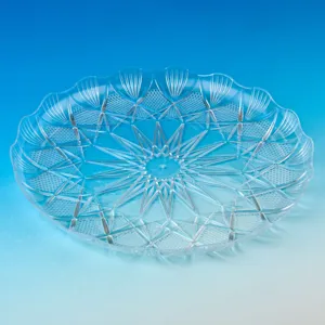 Platou servire rotund din plastic transparent cu modele reliefate