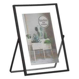 Ramă foto metalică transparentă cu suport, dimensiune 10x15 cm