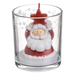Lumanare decorativă de Craciun cu figurina Mos Craciun în pahar transparent