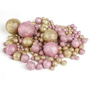 Globuri decorative de Crăciun din spumă roz și bej cu glitter