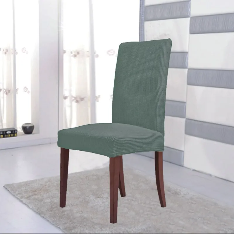 Husa decorativa elastică pentru scaun verde menta cu carouri în relief – poza 2