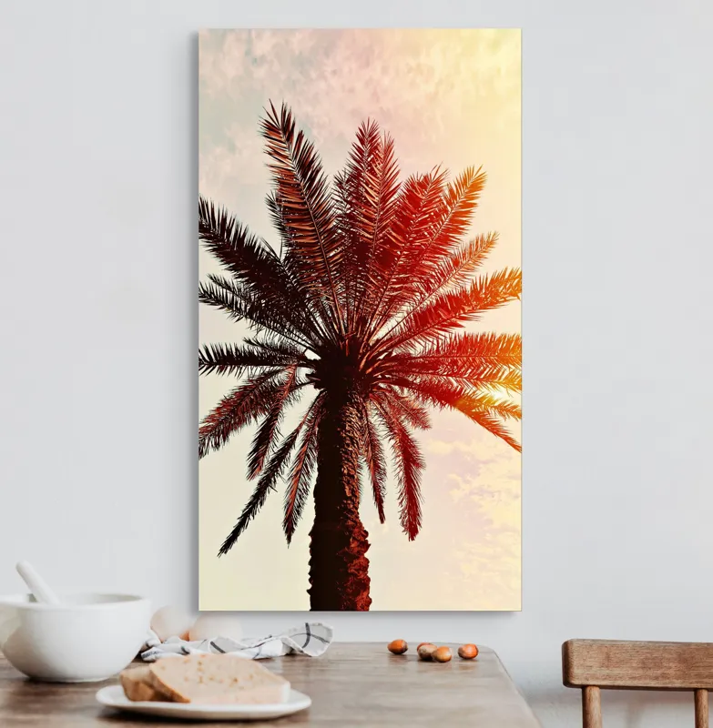 Tablou Canvas, "Apus de soare printre frunze tropicale", Palmier, Apus, Siluetă, Cer, Soare, Frunze, Culoare, Lumină, 50 x 90 cm – poza 3