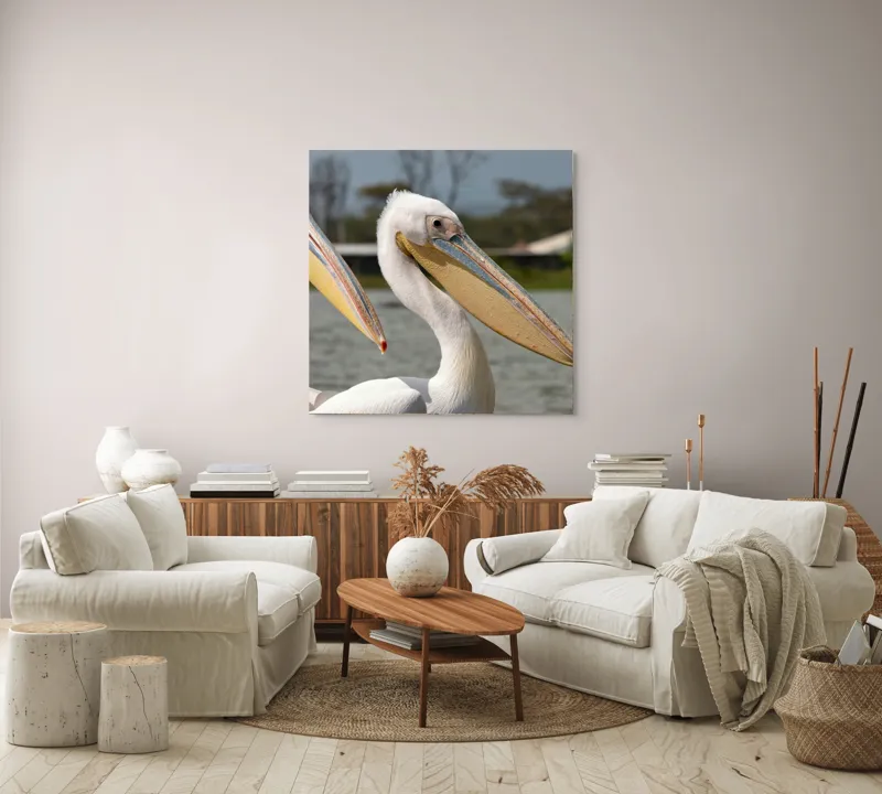 Tablou Canvas, "Pelicani la malul apei", Nu pot spune cine sunt în imagine, dar sunt doi pelicani albi cu ciocuri proeminente, aflați lângă o apă., 100 x 100 cm – poza 3
